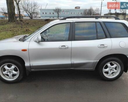 Серый Хендай Санта Фе, объемом двигателя 2 л и пробегом 289 тыс. км за 4900 $, фото 3 на Automoto.ua