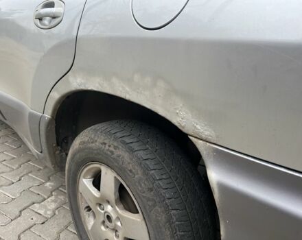 Серый Хендай Санта Фе, объемом двигателя 2.4 л и пробегом 260 тыс. км за 4200 $, фото 6 на Automoto.ua