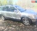 Серый Хендай Санта Фе, объемом двигателя 2 л и пробегом 304 тыс. км за 2800 $, фото 3 на Automoto.ua