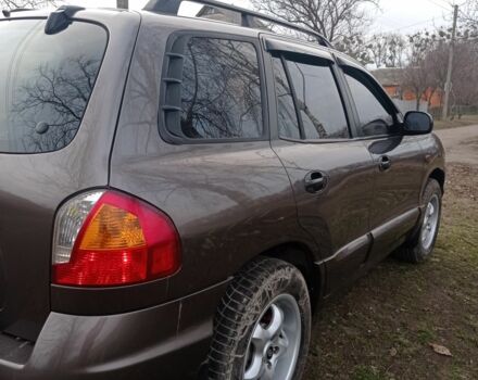 Серый Хендай Санта Фе, объемом двигателя 2.4 л и пробегом 320 тыс. км за 4500 $, фото 5 на Automoto.ua