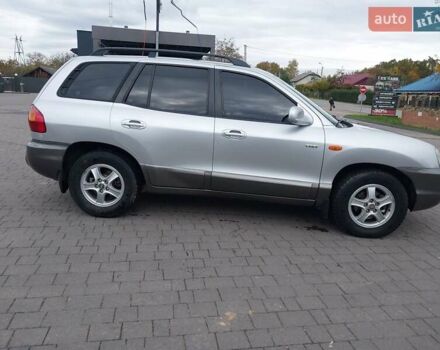 Серый Хендай Санта Фе, объемом двигателя 1.99 л и пробегом 300 тыс. км за 5650 $, фото 4 на Automoto.ua