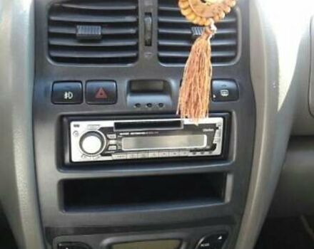 Серый Хендай Санта Фе, объемом двигателя 2 л и пробегом 425 тыс. км за 5100 $, фото 10 на Automoto.ua