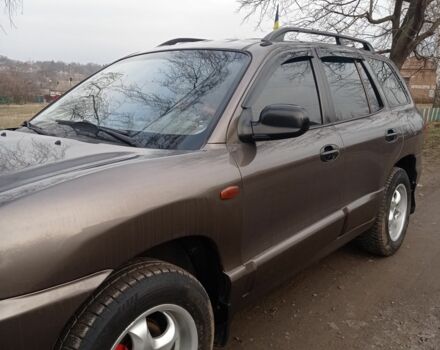 Серый Хендай Санта Фе, объемом двигателя 2.4 л и пробегом 320 тыс. км за 4500 $, фото 2 на Automoto.ua