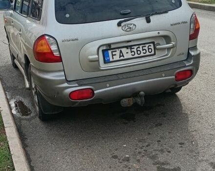 Сірий Хендай Санта Фе, об'ємом двигуна 2 л та пробігом 200 тис. км за 3809 $, фото 1 на Automoto.ua