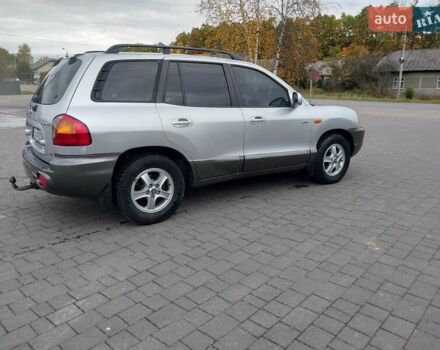 Серый Хендай Санта Фе, объемом двигателя 1.99 л и пробегом 300 тыс. км за 5650 $, фото 6 на Automoto.ua