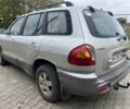 Серый Хендай Санта Фе, объемом двигателя 2.4 л и пробегом 260 тыс. км за 4200 $, фото 3 на Automoto.ua