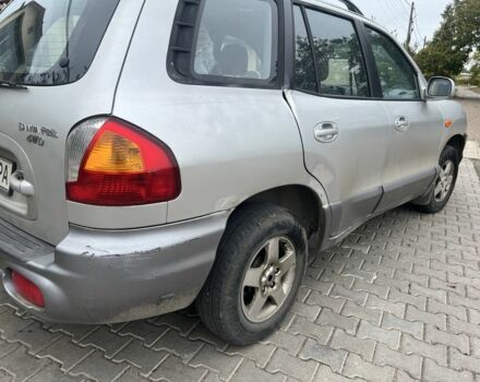 Серый Хендай Санта Фе, объемом двигателя 2.4 л и пробегом 260 тыс. км за 4200 $, фото 5 на Automoto.ua