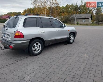 Серый Хендай Санта Фе, объемом двигателя 1.99 л и пробегом 300 тыс. км за 5650 $, фото 7 на Automoto.ua