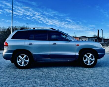 Серый Хендай Санта Фе, объемом двигателя 2.4 л и пробегом 262 тыс. км за 6900 $, фото 1 на Automoto.ua