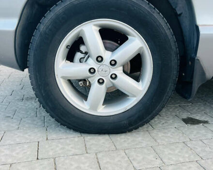 Серый Хендай Санта Фе, объемом двигателя 2.4 л и пробегом 262 тыс. км за 6900 $, фото 60 на Automoto.ua