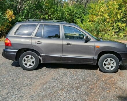 Серый Хендай Санта Фе, объемом двигателя 2 л и пробегом 263 тыс. км за 3600 $, фото 2 на Automoto.ua