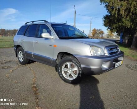 Серый Хендай Санта Фе, объемом двигателя 2 л и пробегом 237 тыс. км за 4200 $, фото 3 на Automoto.ua