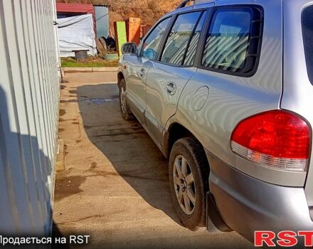 Серый Хендай Санта Фе, объемом двигателя 2 л и пробегом 252 тыс. км за 6000 $, фото 4 на Automoto.ua