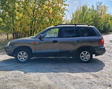 Серый Хендай Санта Фе, объемом двигателя 2 л и пробегом 263 тыс. км за 3600 $, фото 1 на Automoto.ua