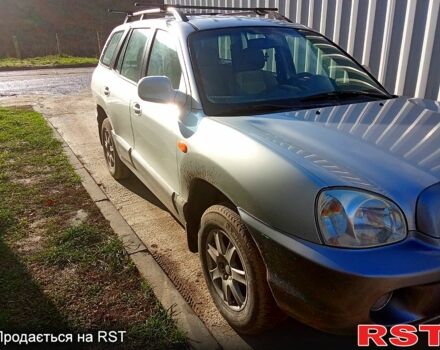 Серый Хендай Санта Фе, объемом двигателя 2 л и пробегом 252 тыс. км за 6000 $, фото 1 на Automoto.ua