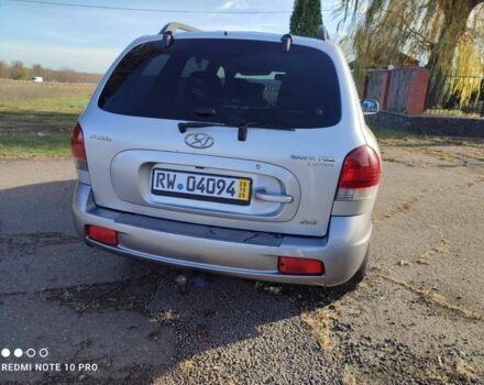 Серый Хендай Санта Фе, объемом двигателя 2 л и пробегом 237 тыс. км за 4200 $, фото 2 на Automoto.ua