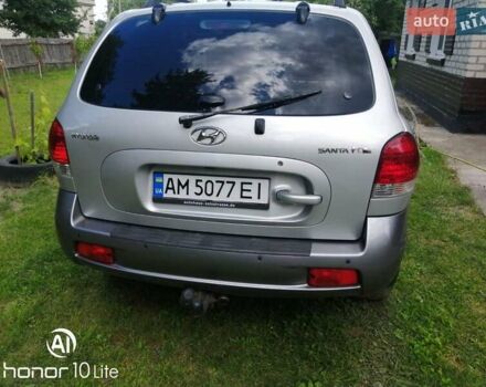 Серый Хендай Санта Фе, объемом двигателя 2.4 л и пробегом 263 тыс. км за 6350 $, фото 6 на Automoto.ua
