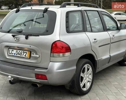 Серый Хендай Санта Фе, объемом двигателя 2.4 л и пробегом 220 тыс. км за 6750 $, фото 1 на Automoto.ua