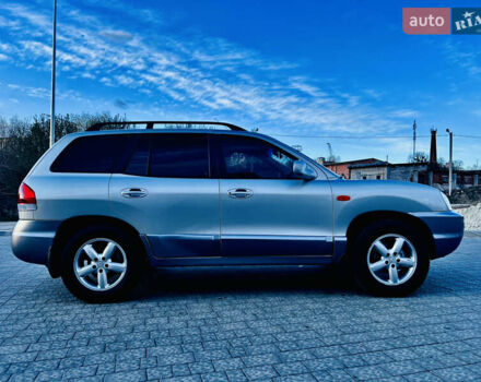 Серый Хендай Санта Фе, объемом двигателя 2.4 л и пробегом 262 тыс. км за 6900 $, фото 7 на Automoto.ua