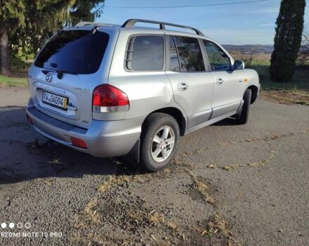 Серый Хендай Санта Фе, объемом двигателя 2 л и пробегом 237 тыс. км за 4200 $, фото 4 на Automoto.ua