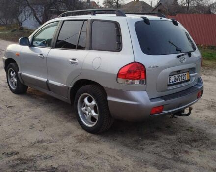 Серый Хендай Санта Фе, объемом двигателя 2.4 л и пробегом 260 тыс. км за 3300 $, фото 2 на Automoto.ua