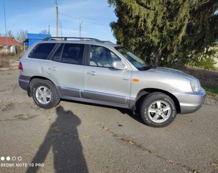 Серый Хендай Санта Фе, объемом двигателя 2 л и пробегом 237 тыс. км за 4200 $, фото 5 на Automoto.ua