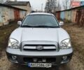 Серый Хендай Санта Фе, объемом двигателя 2 л и пробегом 370 тыс. км за 5600 $, фото 1 на Automoto.ua