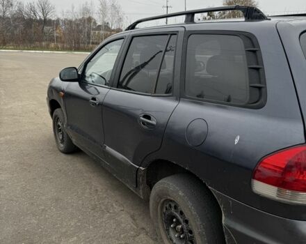 Серый Хендай Санта Фе, объемом двигателя 2 л и пробегом 344 тыс. км за 3095 $, фото 1 на Automoto.ua