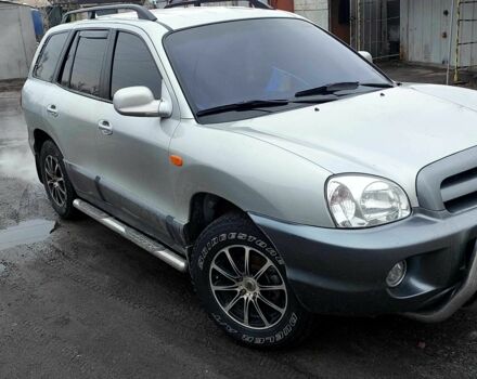 Серый Хендай Санта Фе, объемом двигателя 2 л и пробегом 200 тыс. км за 7650 $, фото 2 на Automoto.ua