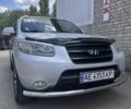 Серый Хендай Санта Фе, объемом двигателя 2.7 л и пробегом 244 тыс. км за 10300 $, фото 1 на Automoto.ua