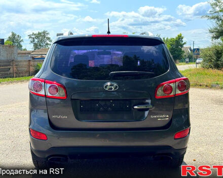 Серый Хендай Санта Фе, объемом двигателя 2.4 л и пробегом 170 тыс. км за 11450 $, фото 4 на Automoto.ua