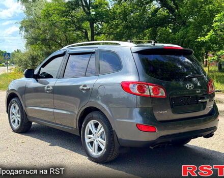 Серый Хендай Санта Фе, объемом двигателя 2.4 л и пробегом 170 тыс. км за 11450 $, фото 5 на Automoto.ua
