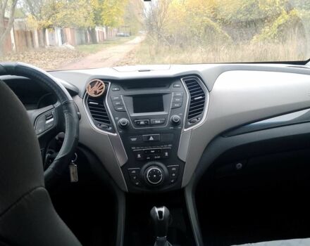 Серый Хендай Санта Фе, объемом двигателя 2.4 л и пробегом 147 тыс. км за 14700 $, фото 7 на Automoto.ua