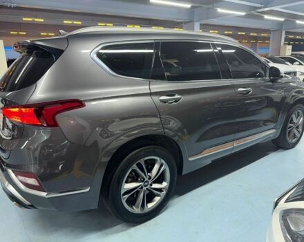 Серый Хендай Санта Фе, объемом двигателя 2 л и пробегом 125 тыс. км за 33000 $, фото 2 на Automoto.ua