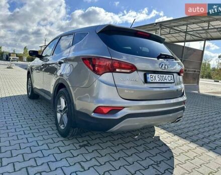 Серый Хендай Санта Фе, объемом двигателя 2.36 л и пробегом 112 тыс. км за 14900 $, фото 6 на Automoto.ua
