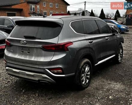 Серый Хендай Санта Фе, объемом двигателя 2.4 л и пробегом 164 тыс. км за 15200 $, фото 4 на Automoto.ua