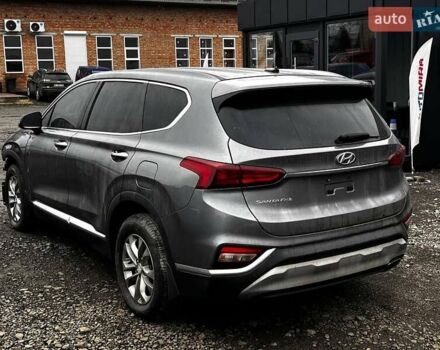 Серый Хендай Санта Фе, объемом двигателя 2.4 л и пробегом 164 тыс. км за 15200 $, фото 6 на Automoto.ua