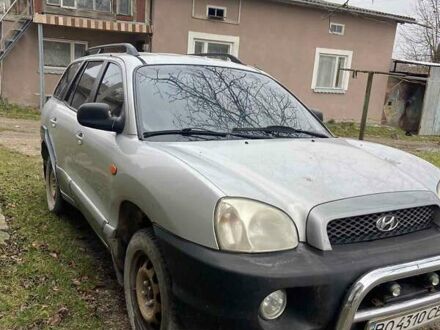 Серый Хендай Санта Фе, объемом двигателя 2.4 л и пробегом 250 тыс. км за 5000 $, фото 1 на Automoto.ua