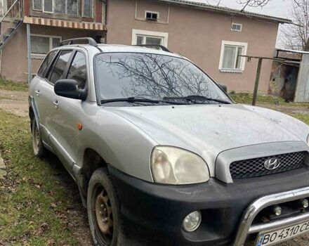 Серый Хендай Санта Фе, объемом двигателя 2.4 л и пробегом 250 тыс. км за 5000 $, фото 1 на Automoto.ua