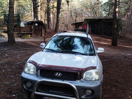 Серый Хендай Санта Фе, объемом двигателя 2.4 л и пробегом 250 тыс. км за 5500 $, фото 1 на Automoto.ua