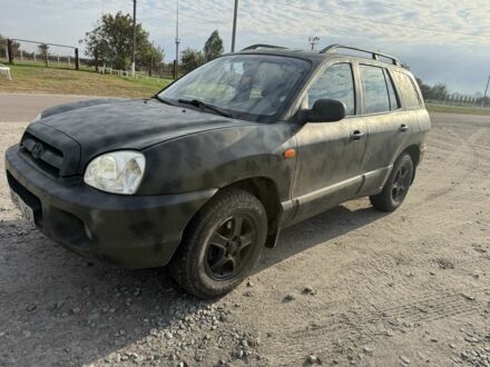 Серый Хендай Санта Фе, объемом двигателя 2.4 л и пробегом 300 тыс. км за 2200 $, фото 1 на Automoto.ua