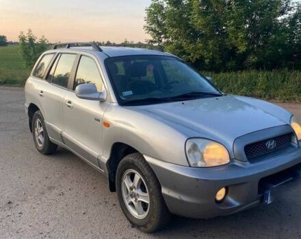 Серый Хендай Санта Фе, объемом двигателя 2 л и пробегом 233 тыс. км за 3500 $, фото 1 на Automoto.ua