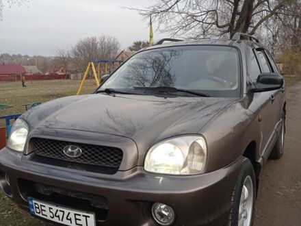 Серый Хендай Санта Фе, объемом двигателя 2.4 л и пробегом 320 тыс. км за 4500 $, фото 1 на Automoto.ua