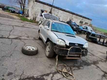 Серый Хендай Санта Фе, объемом двигателя 2 л и пробегом 270 тыс. км за 405 $, фото 1 на Automoto.ua