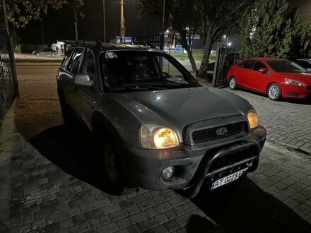 Серый Хендай Санта Фе, объемом двигателя 2 л и пробегом 220 тыс. км за 4200 $, фото 1 на Automoto.ua