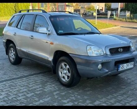 Серый Хендай Санта Фе, объемом двигателя 2 л и пробегом 235 тыс. км за 3475 $, фото 1 на Automoto.ua