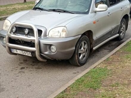 Серый Хендай Санта Фе, объемом двигателя 2 л и пробегом 200 тыс. км за 3809 $, фото 1 на Automoto.ua