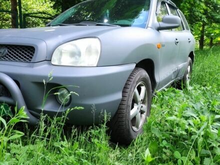 Сірий Хендай Санта Фе, об'ємом двигуна 2.4 л та пробігом 300 тис. км за 5000 $, фото 1 на Automoto.ua