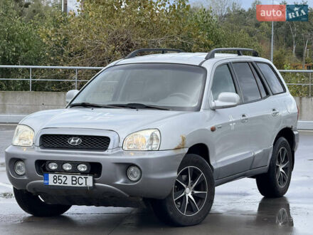 Серый Хендай Санта Фе, объемом двигателя 1.99 л и пробегом 299 тыс. км за 3999 $, фото 1 на Automoto.ua