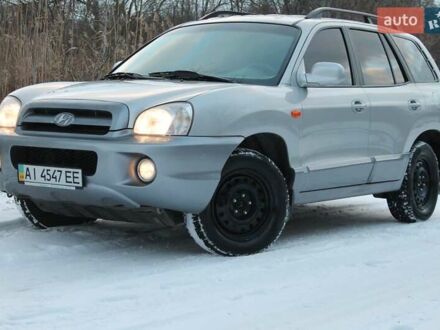 Серый Хендай Санта Фе, объемом двигателя 2 л и пробегом 139 тыс. км за 6777 $, фото 1 на Automoto.ua